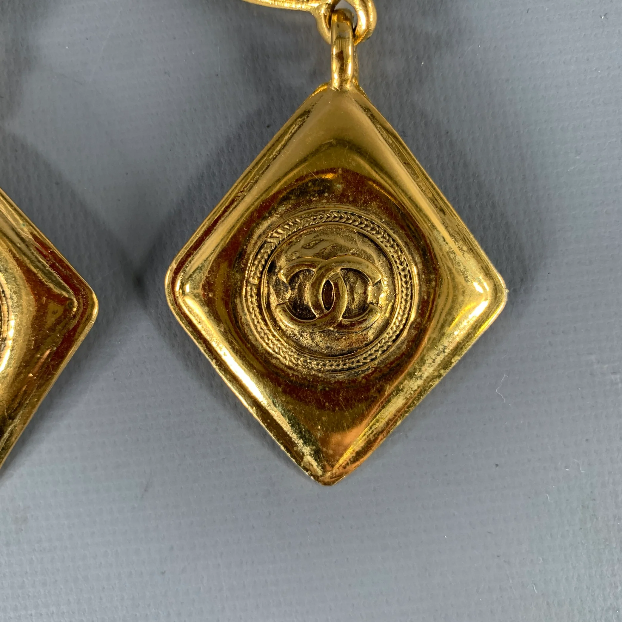 CHANEL Gold Tone Quilted Logo Clip-On Earrings - Image 5