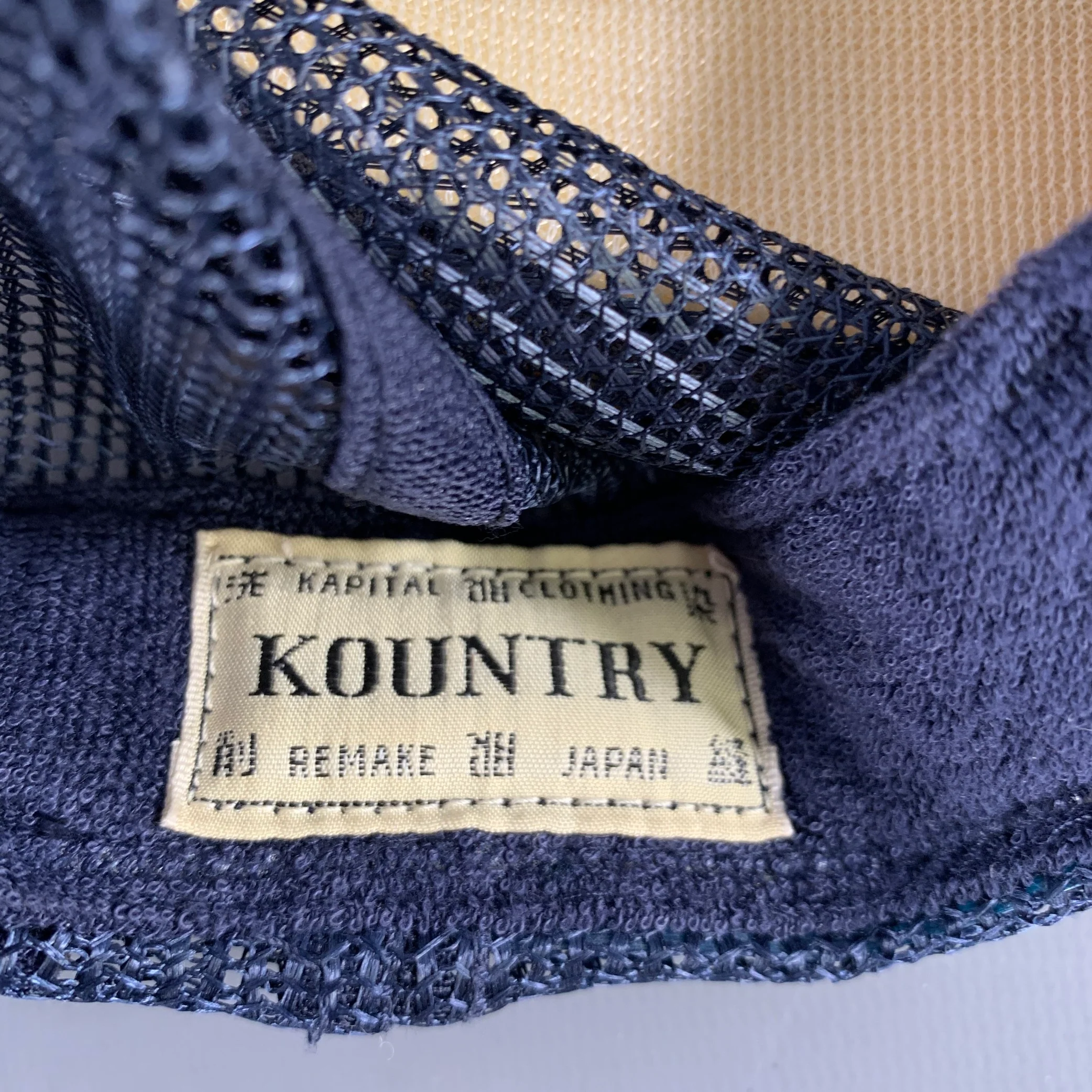 KAPITAL Navy Mustard Print Hats - Image 7