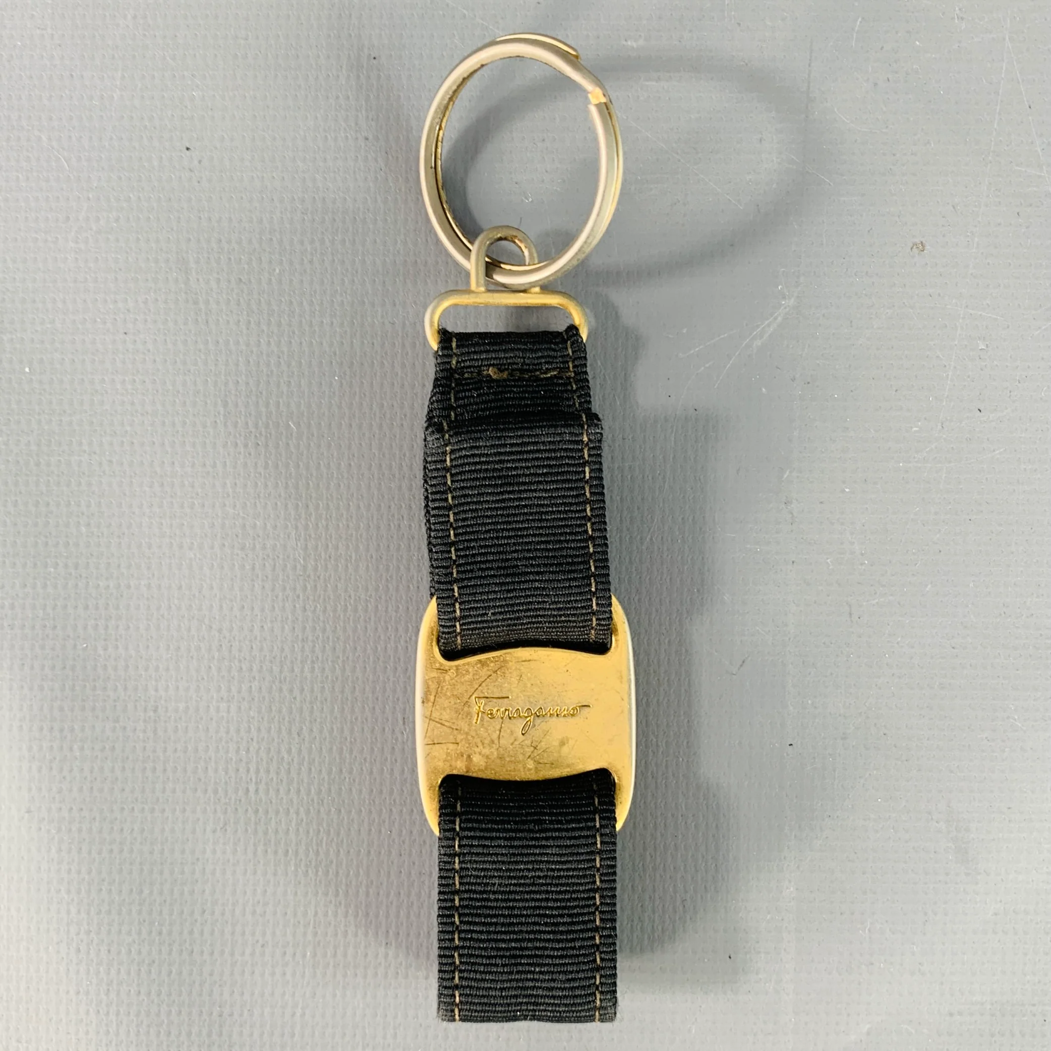 SALVATORE FERRAGAMO Black Gold Nylon Metal Logo Strap Keychain